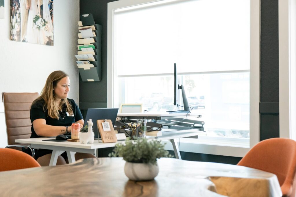 Heather the manager working at her desk