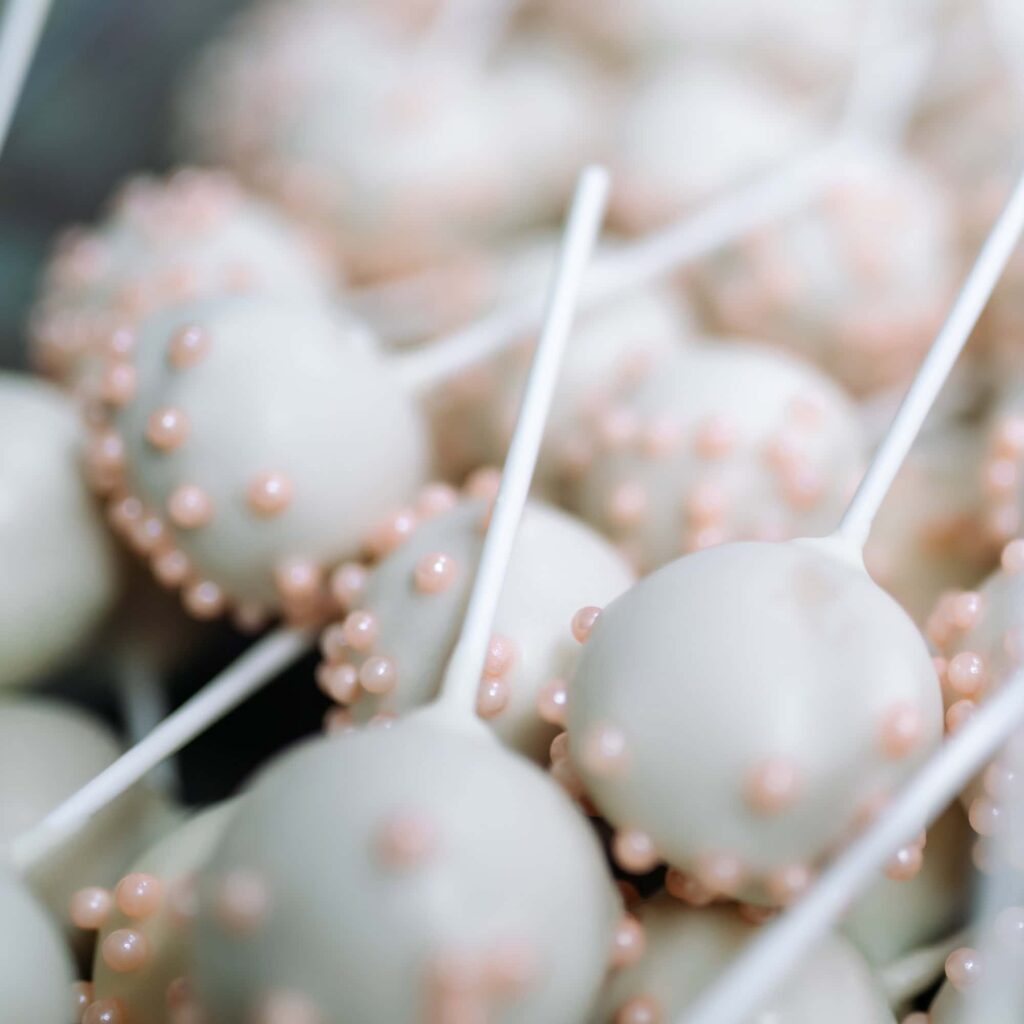 Cake pops to be used as wedding favors baked by CaraMel's Bakery