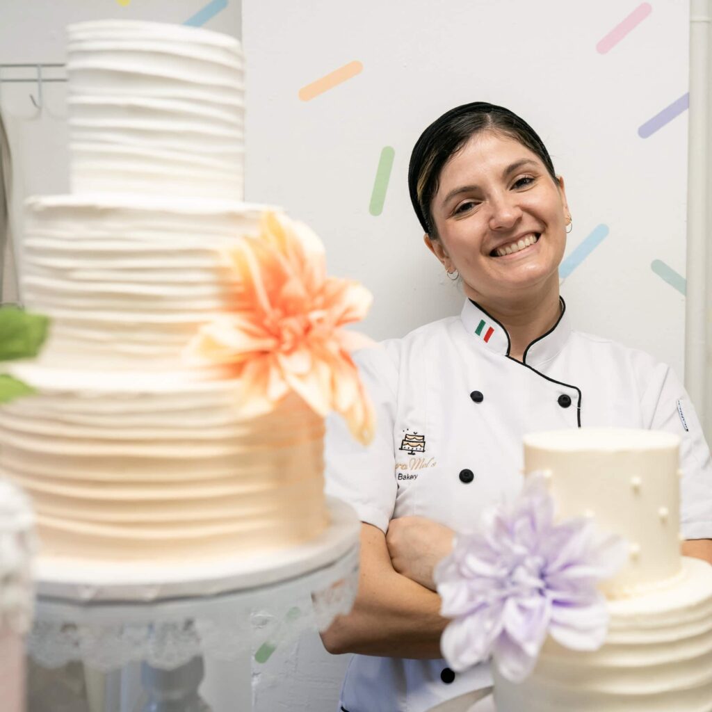 Chef Mel with her wedding cakes