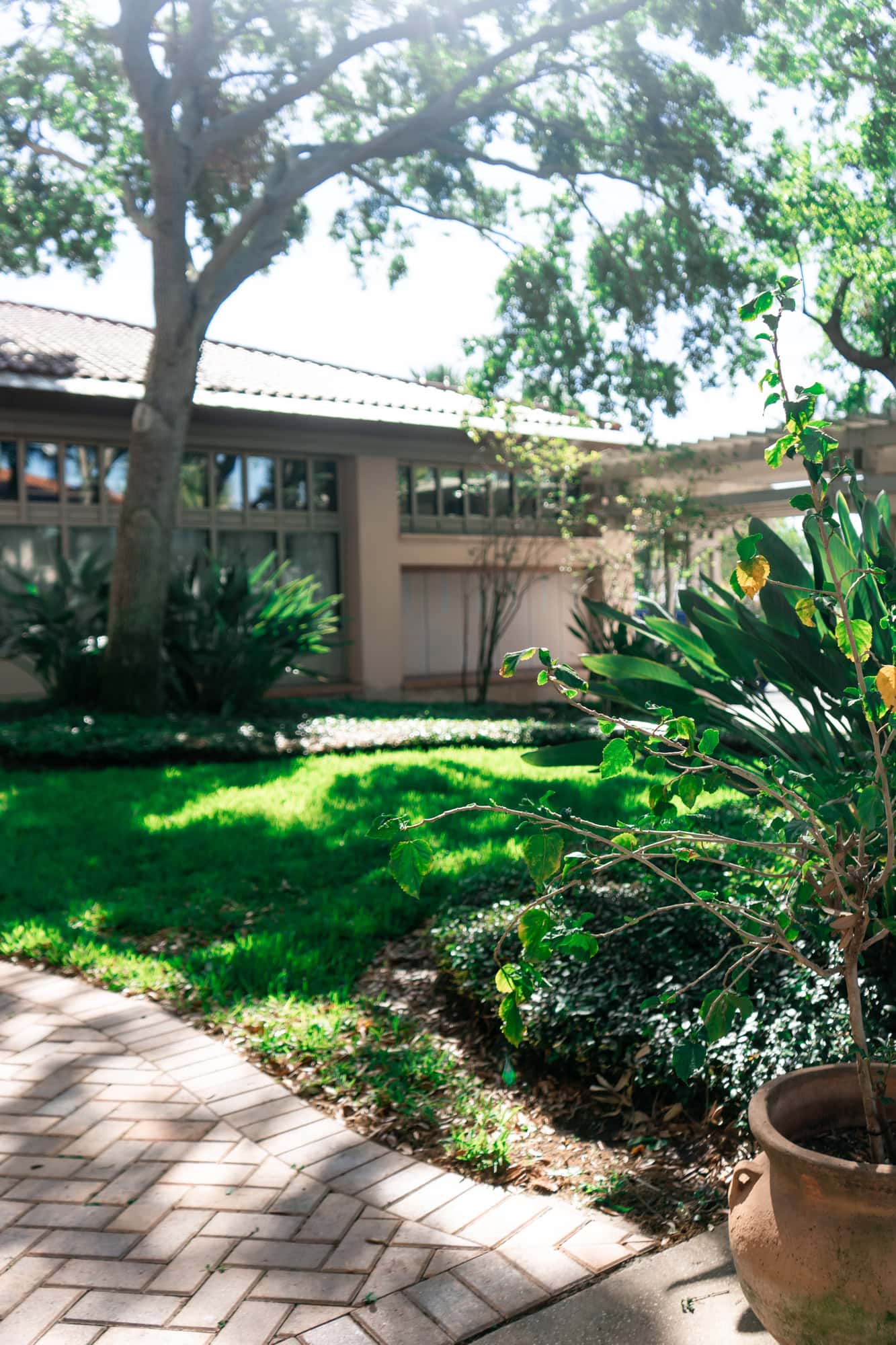 Lush landscaping at the entrance courtyard available to wedding couples