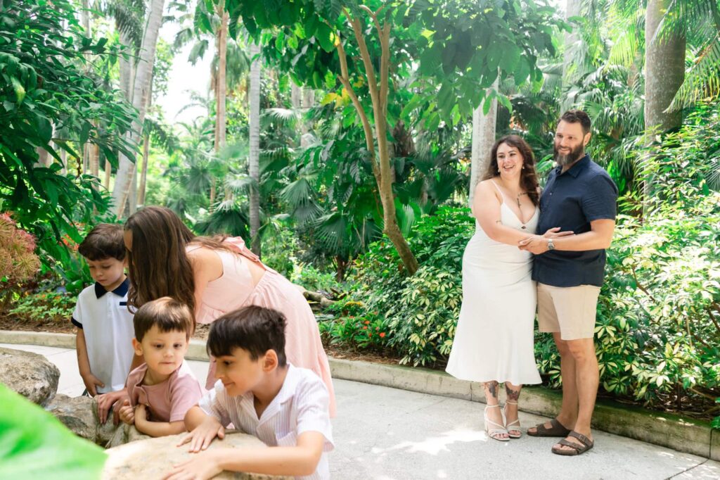 Family exploring together during their Sunken Gardens family photo session in St. Pete