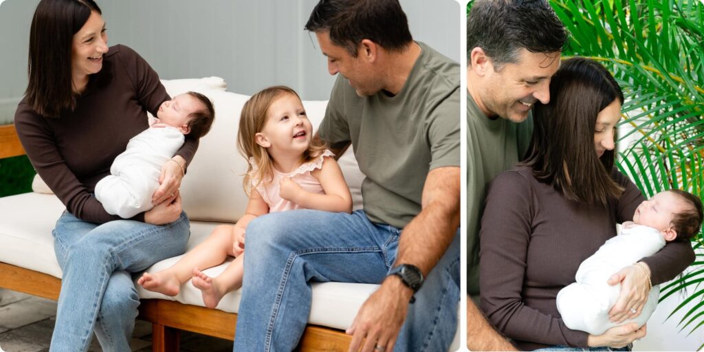 Toddler big sister laughing with her parents and new baby sister during a sibling newborn photography session in St. Petersburg