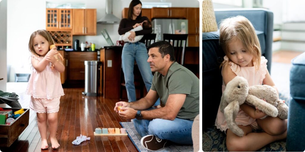 Dad engaging toddler in play on the living room floor while mom holds the newborn nearby, capturing real family life during a Crescent Heights newborn session