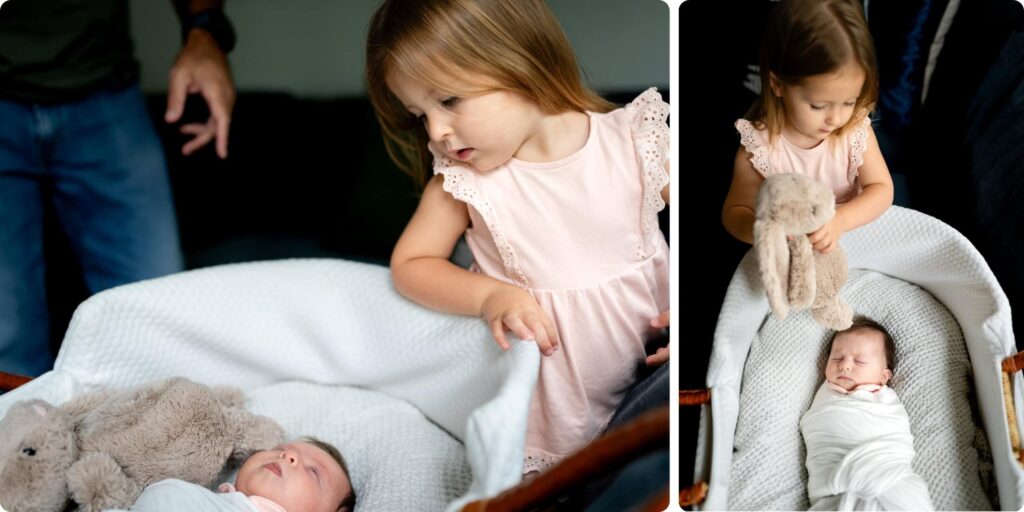 Big sister meeting her newborn baby sister during an in-home sibling newborn session in Crescent Heights, St. Petersburg